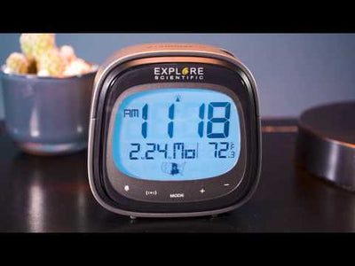 a digital clock on a table